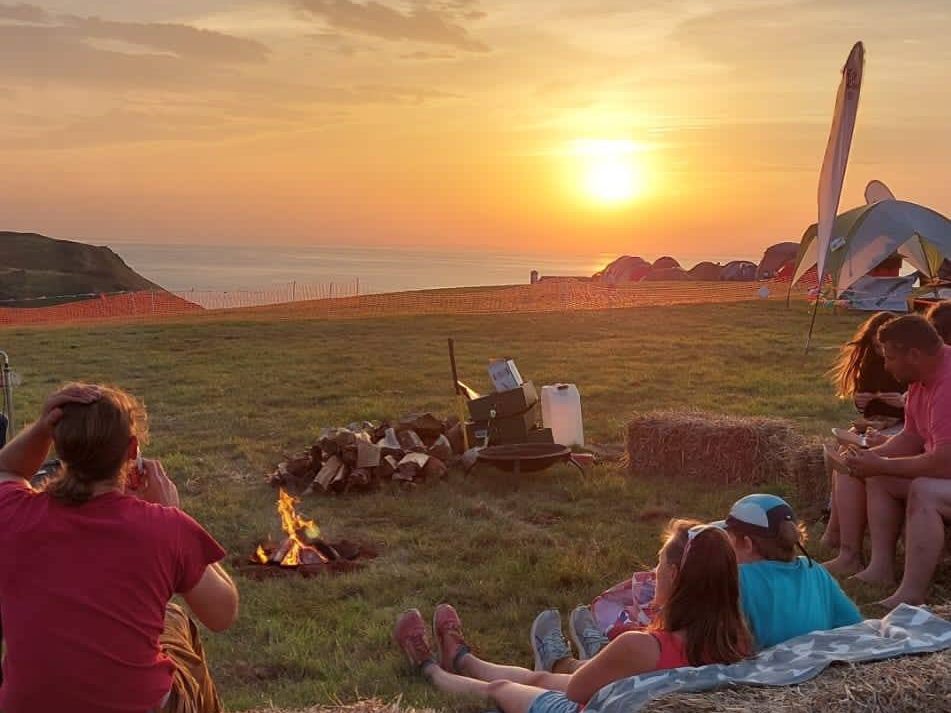 The festival campsite overlooking Hope Cove.