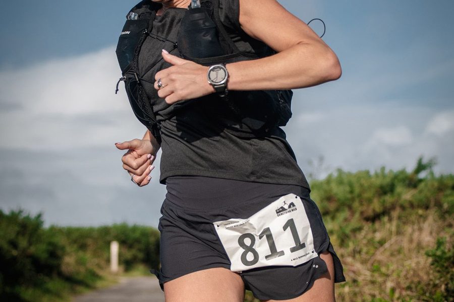 Trail runner enjoying the coastal Half Marathon route.